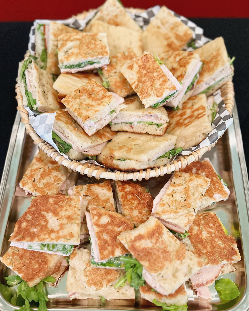 A platter of flatbread sandwiches
